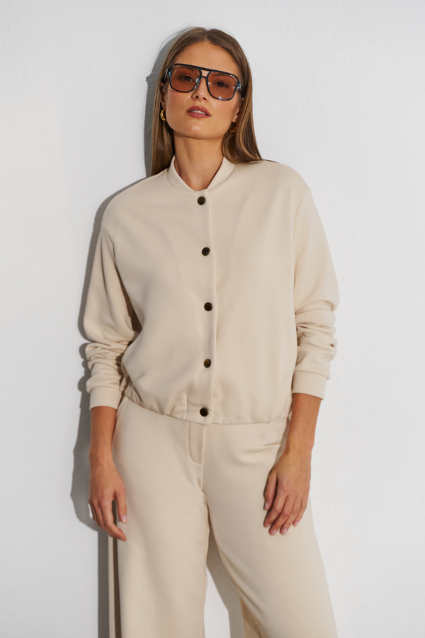 Minimalistyczne spodnie damskie ecru do kompletu