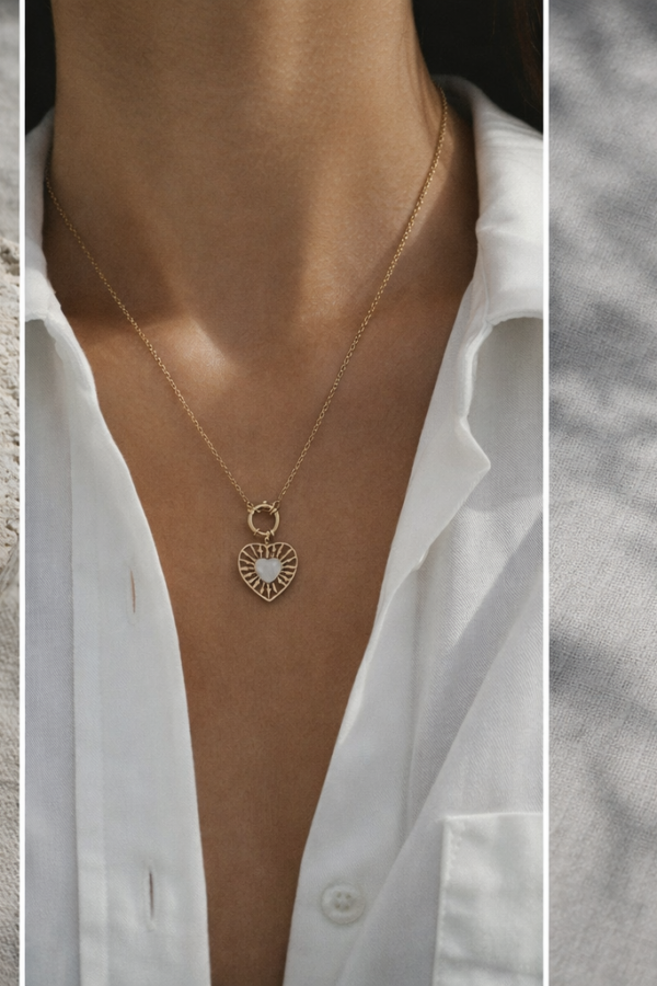 złoty naszyjnik z sercem na kamieniu